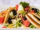 Hühnerschnitzelstreifen auf Melonensalat der Holzke Menü GmbH